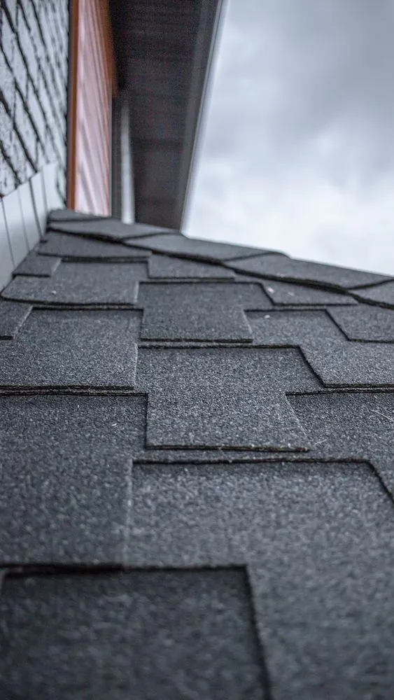 Slide of McCoy Roofing