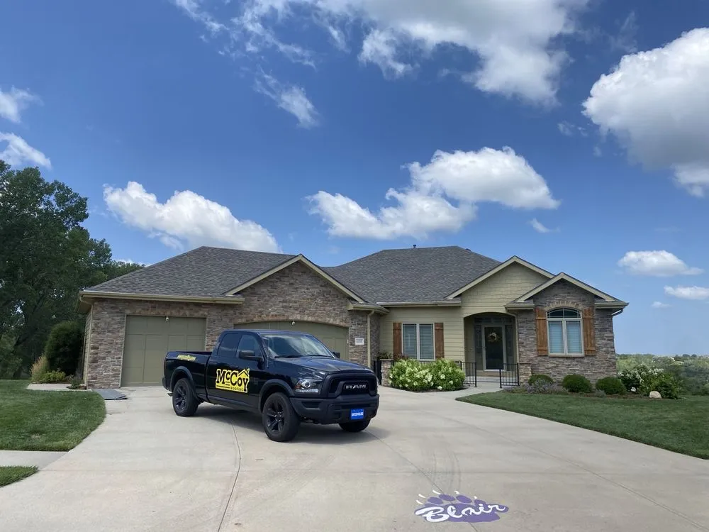 Slide of McCoy Roofing