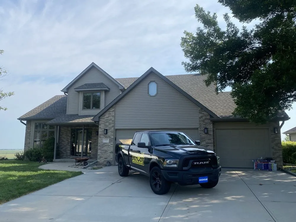 Slide of McCoy Roofing