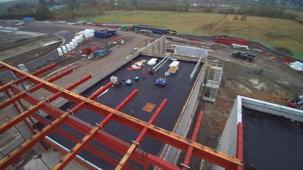 Slide of McDonald & Wetle Roofing