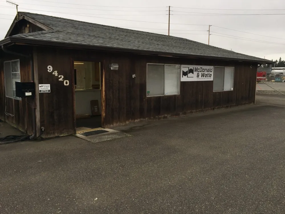 Slide of McDonald & Wetle Roofing