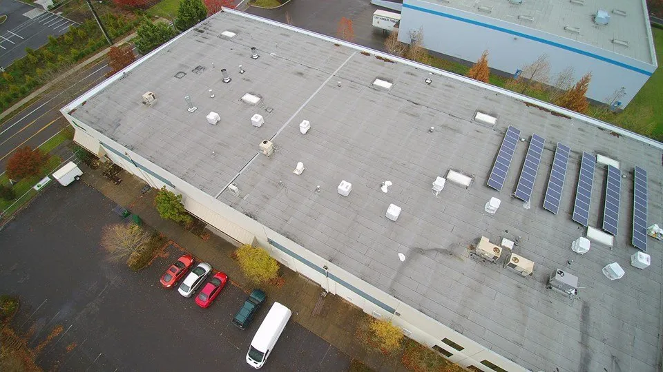 Slide of McDonald & Wetle Roofing