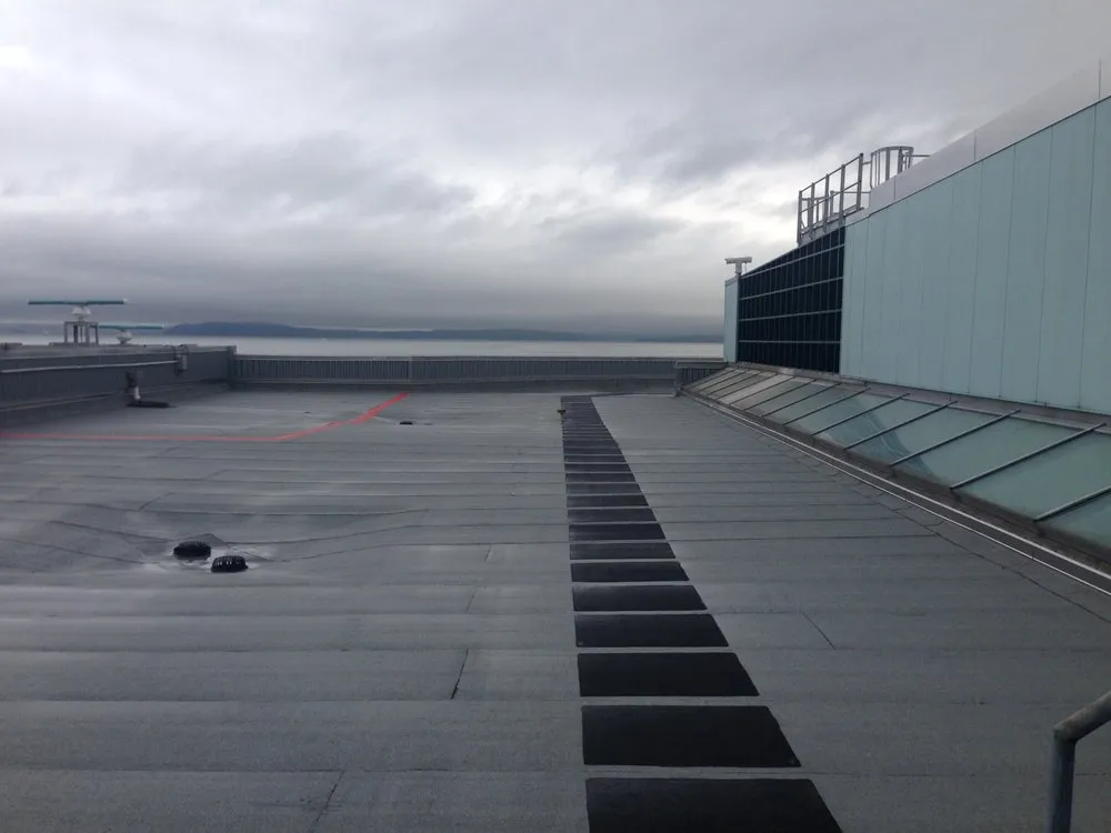 Slide of McDonald & Wetle Roofing