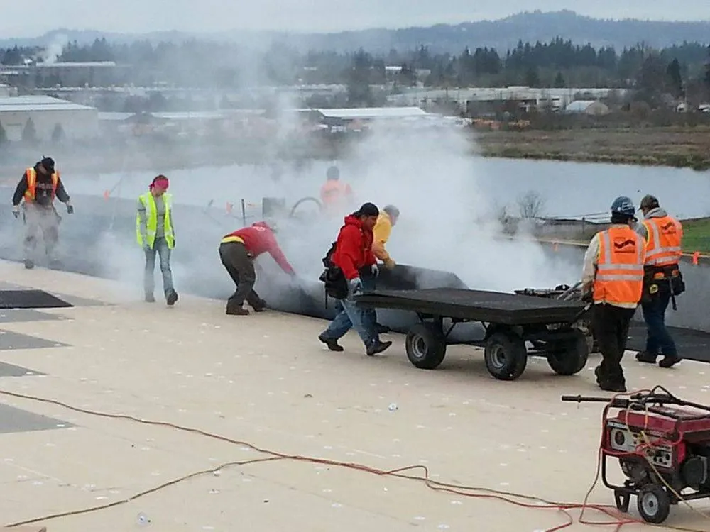 Slide of McDonald & Wetle Roofing