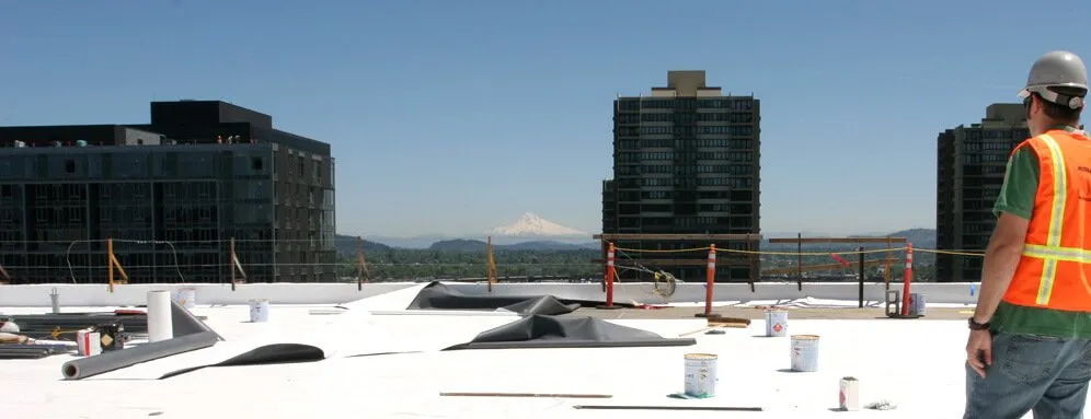 Slide of McDonald & Wetle Roofing