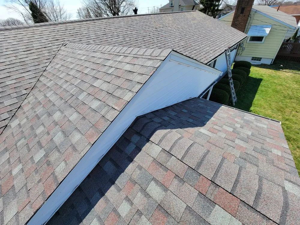 Slide of McDonough Roofing