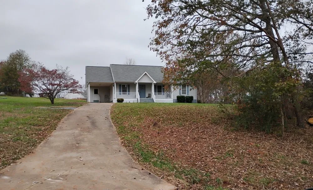 Professional metal roofing installation for homes in Ellenboro, NC by McGinnis Roofing & Siding