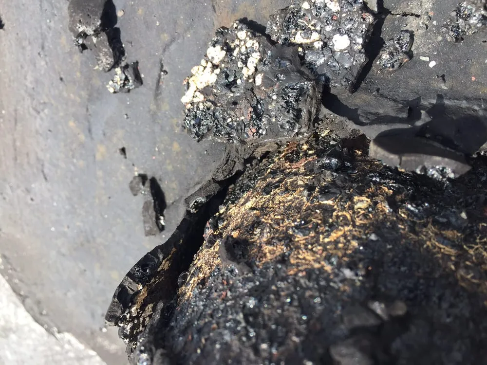 Slide of McGinnis Roofing