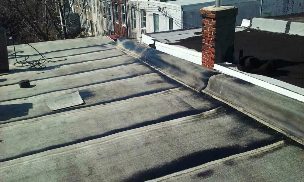 Slide of McGinnis Roofing