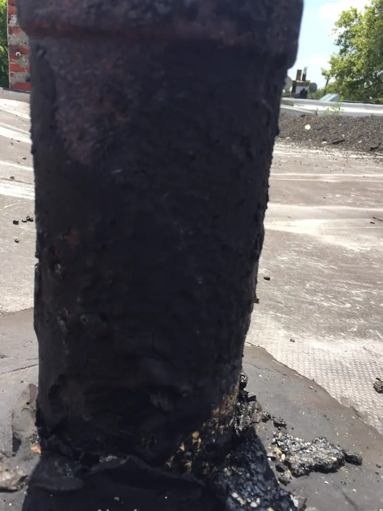 Slide of McGinnis Roofing