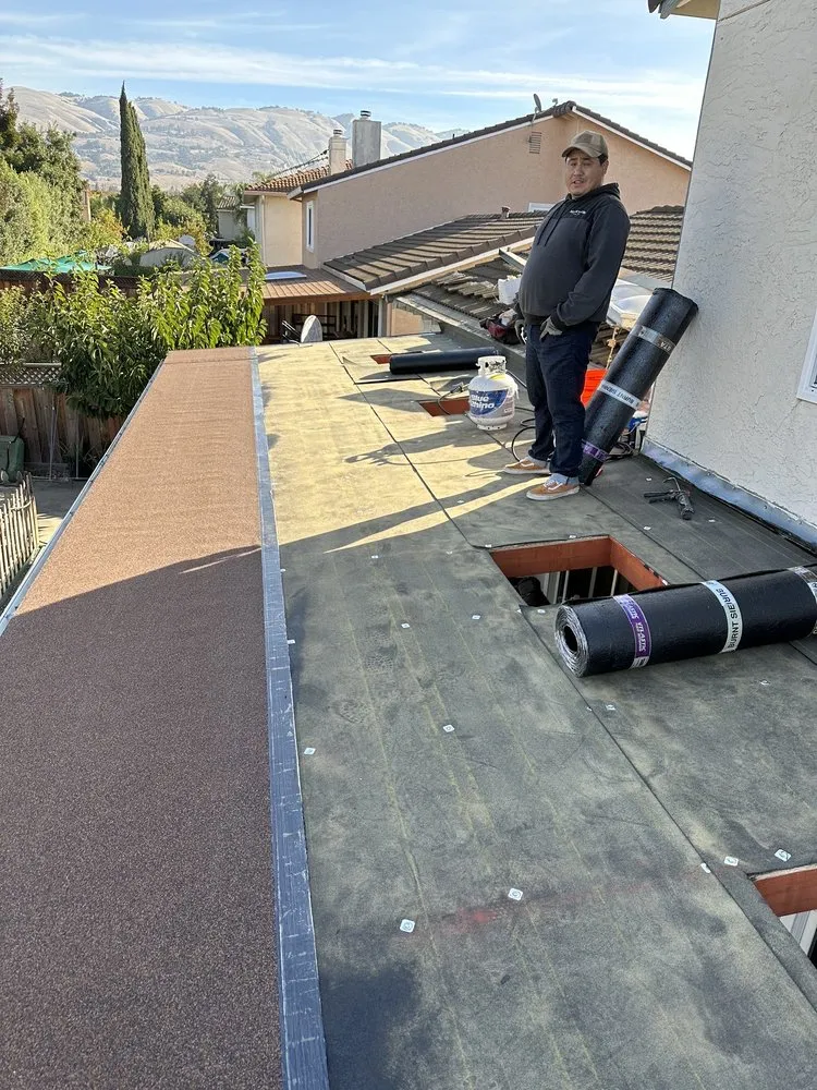 Slide of McGraw and Sons Roofing