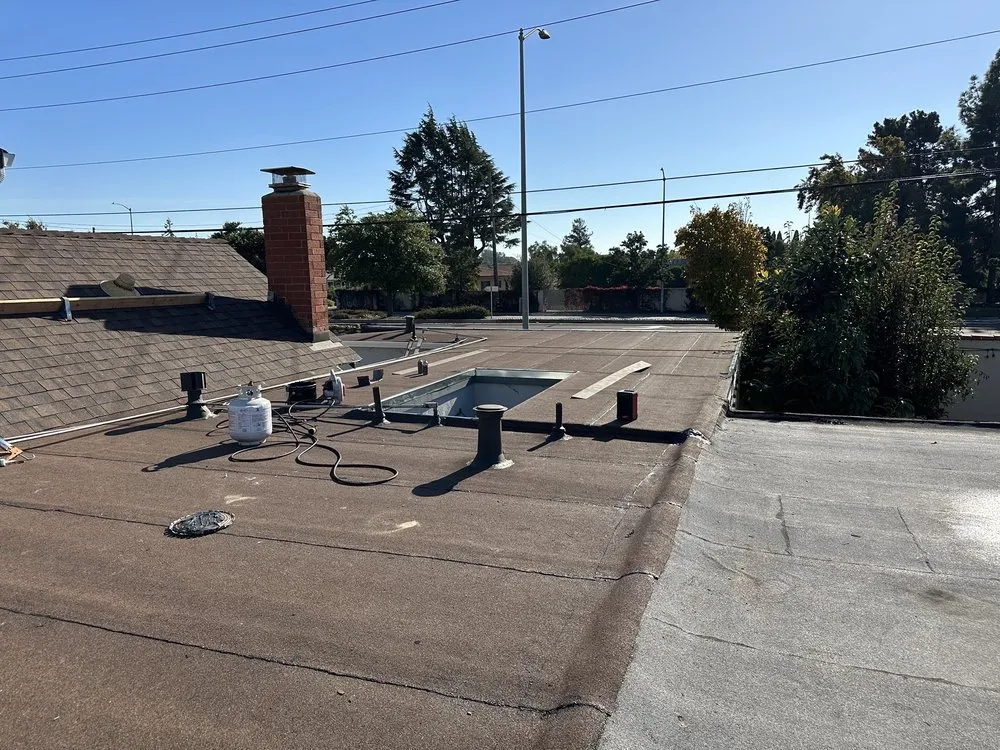 Slide of McGraw and Sons Roofing