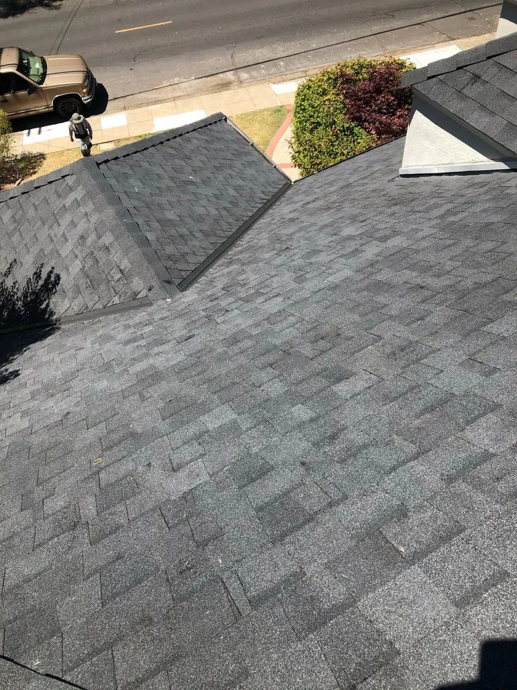 Slide of McGraw and Sons Roofing