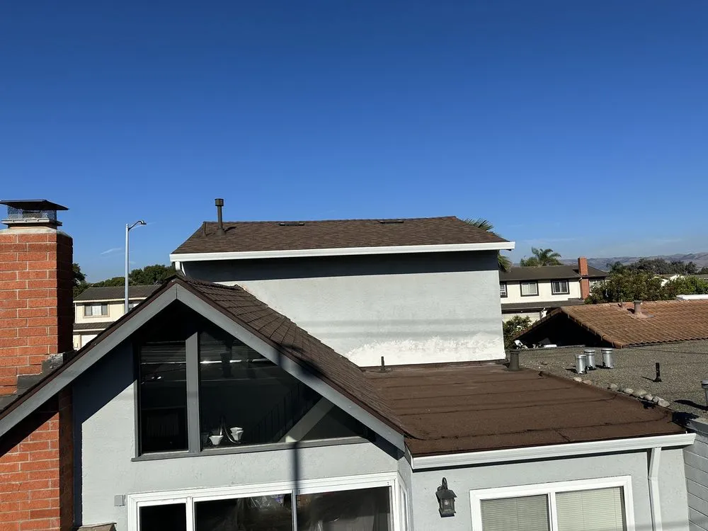 Slide of McGraw and Sons Roofing