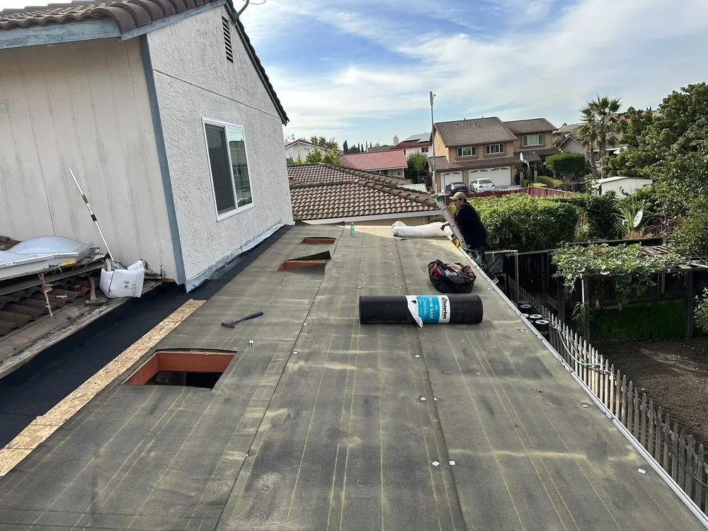 Slide of McGraw and Sons Roofing