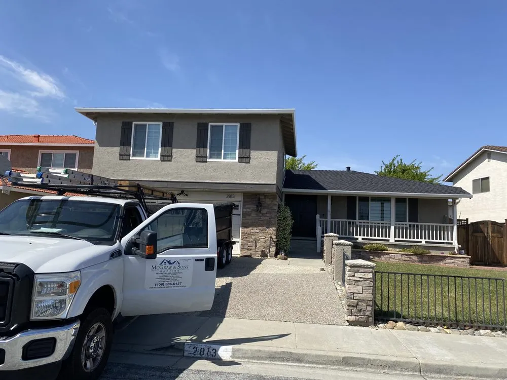 Slide of McGraw and Sons Roofing