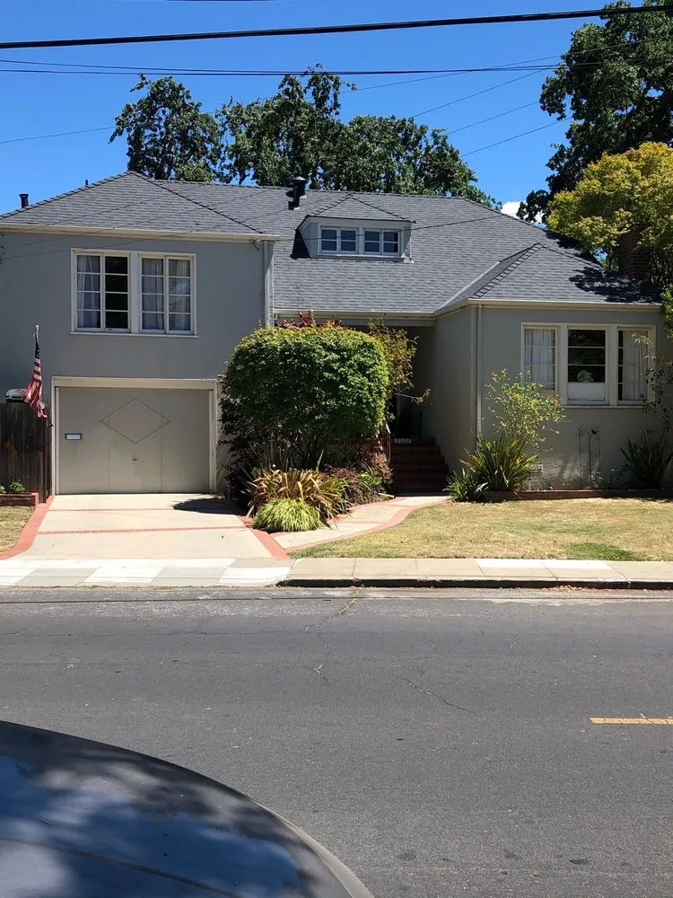 Slide of McGraw and Sons Roofing