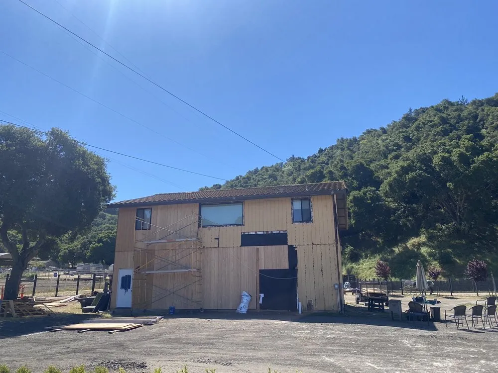 Slide of McGraw and Sons Roofing