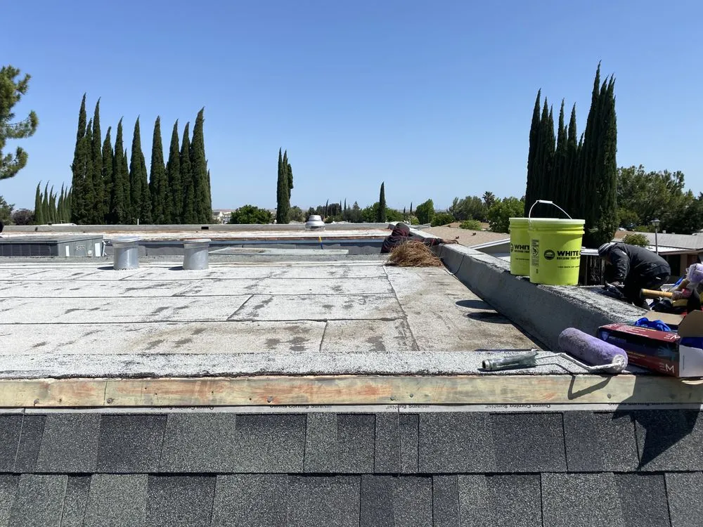 Slide of McGraw and Sons Roofing