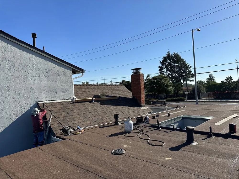 Slide of McGraw and Sons Roofing