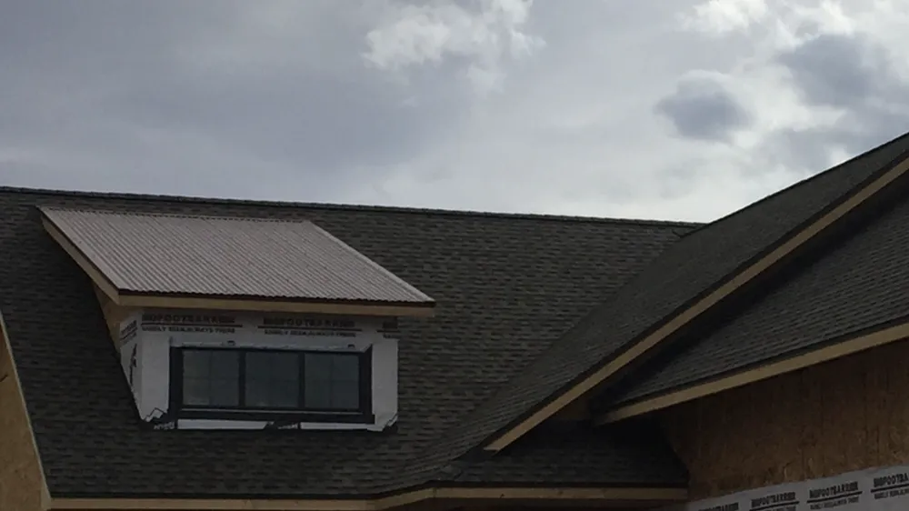 Slide of McG's Roofing