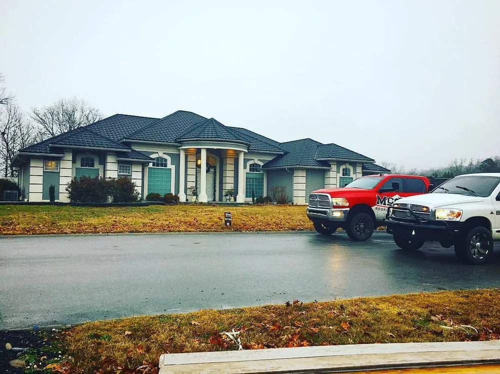 Slide of McGuire Roofing & Construction