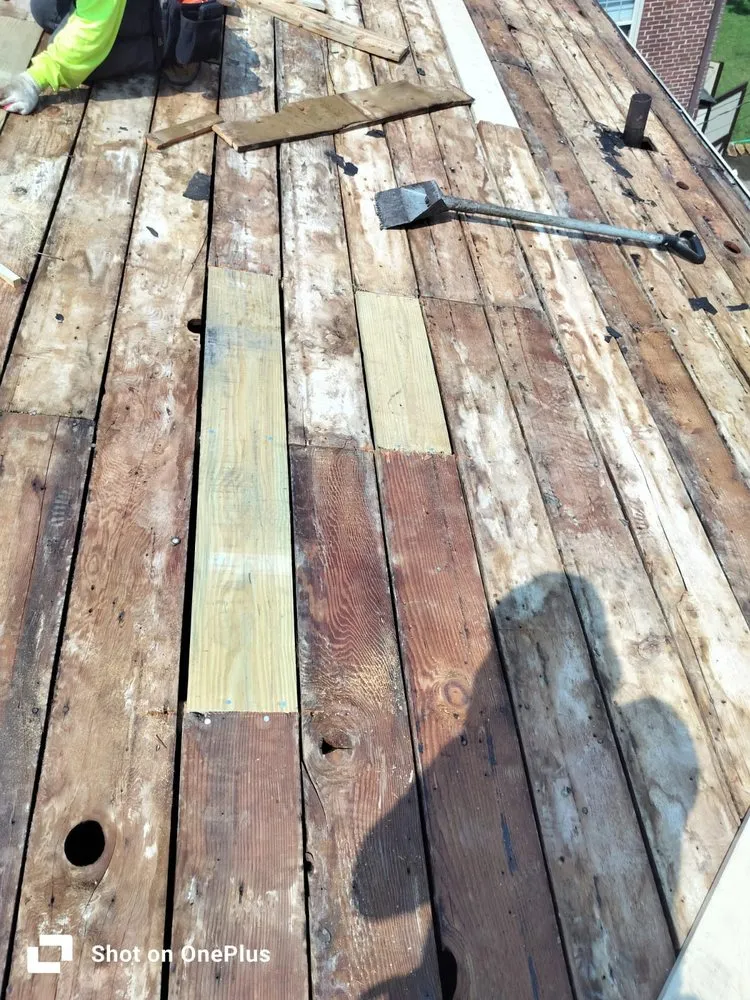 Slide of McGuire Roofing