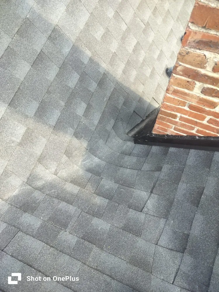 Slide of McGuire Roofing