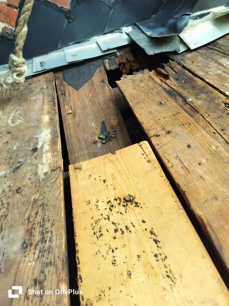 Slide of McGuire Roofing