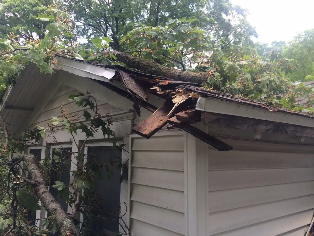 Slide of Mckenzies Roofing