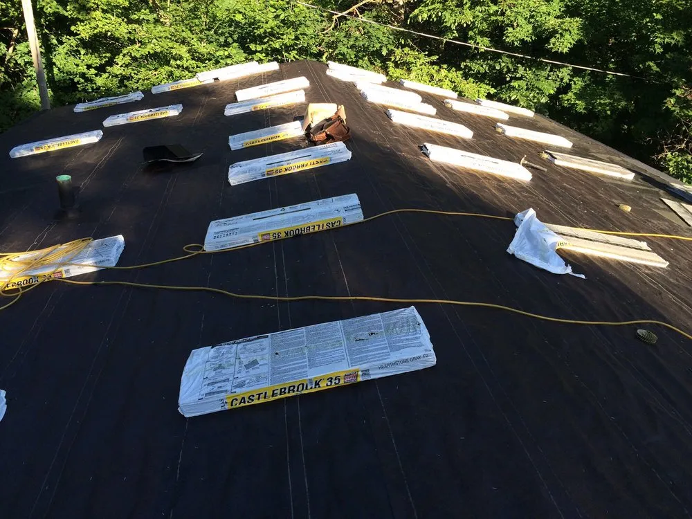 Slide of Mckenzies Roofing