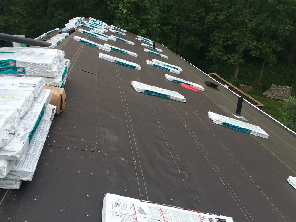 Slide of Mckenzies Roofing