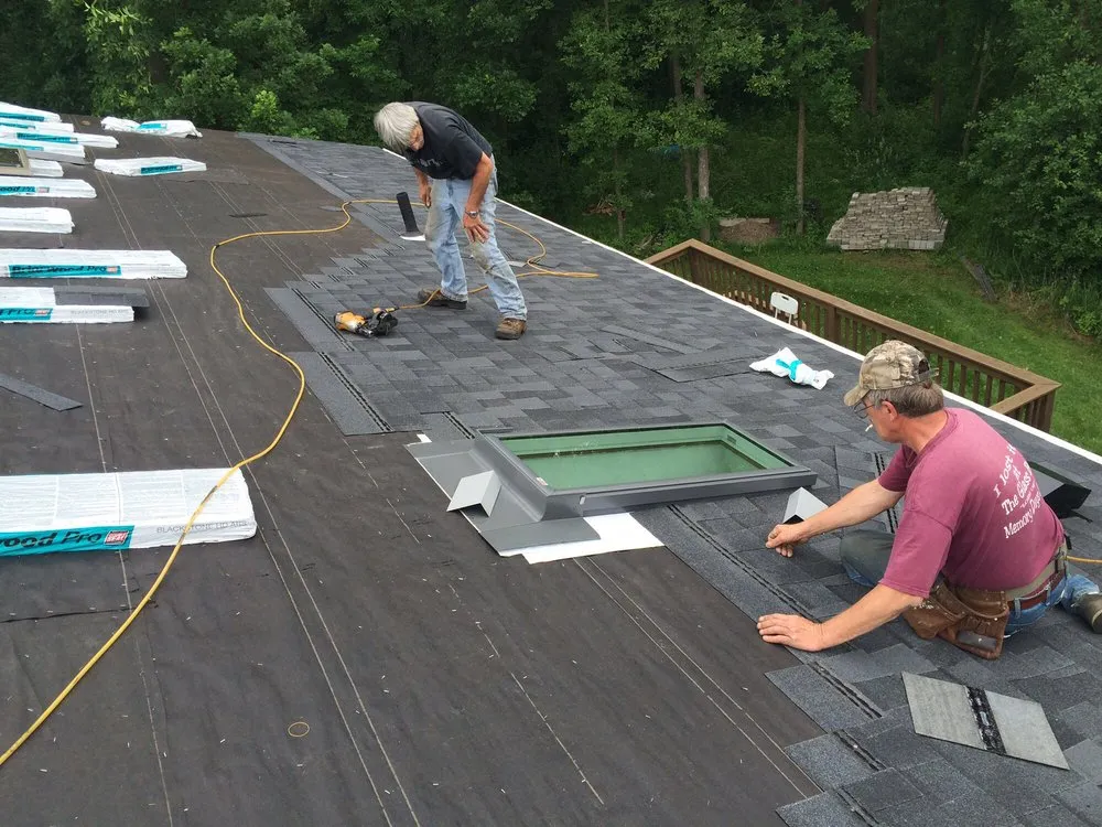 Slide of Mckenzies Roofing