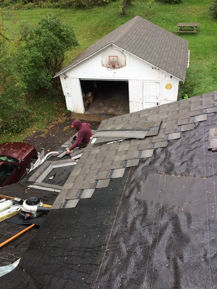 Slide of Mckenzies Roofing