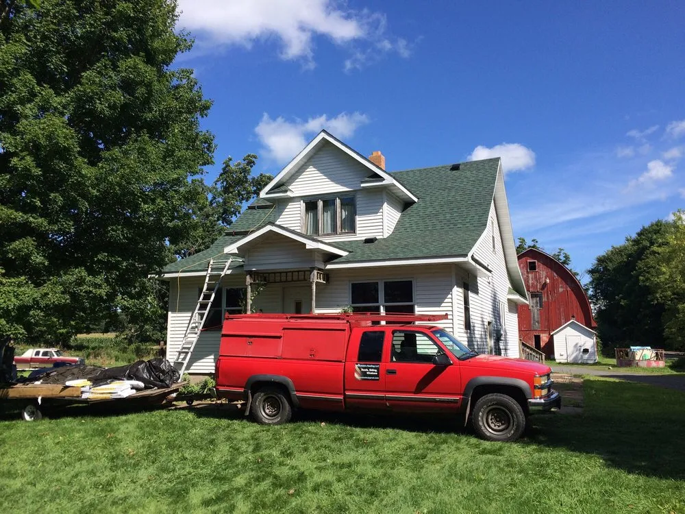 Slide of Mckenzies Roofing