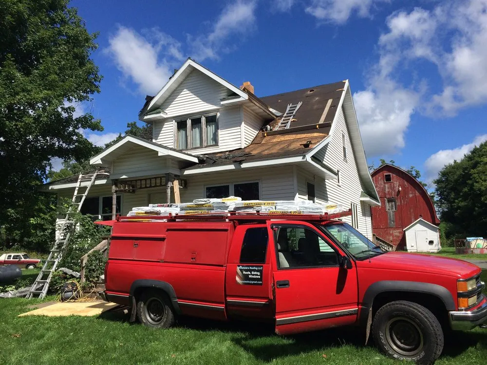 Slide of Mckenzies Roofing