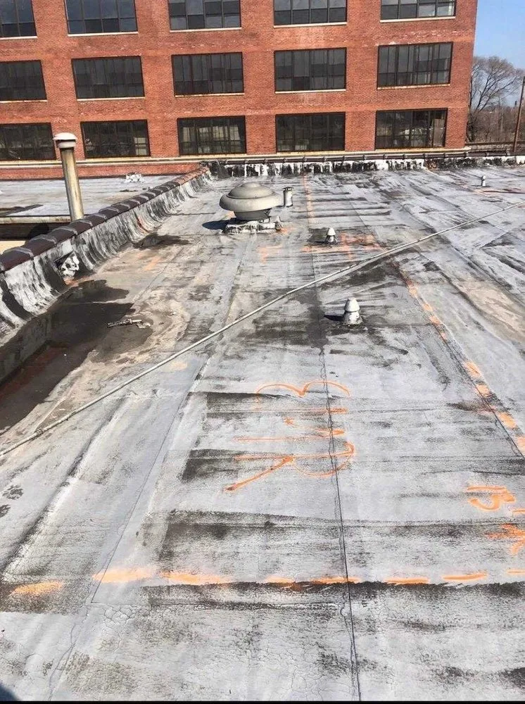 Slide of McKinley Flat Roof Specialists