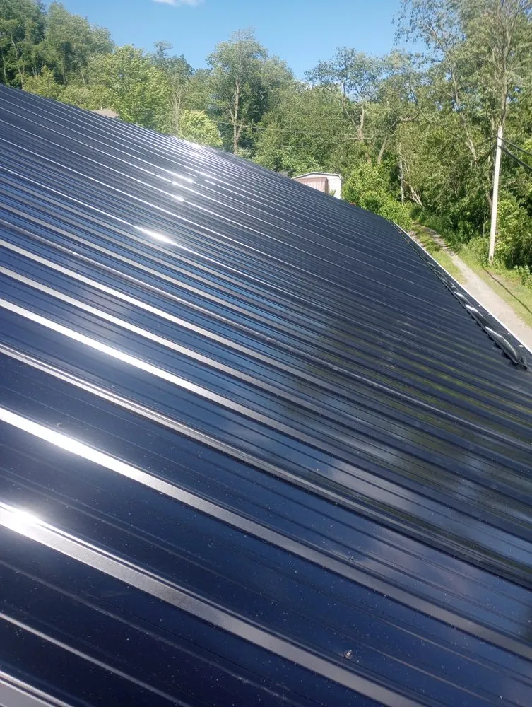 Emergency storm damage roof repair same-day service across Nettie, WV - McKinney Construction