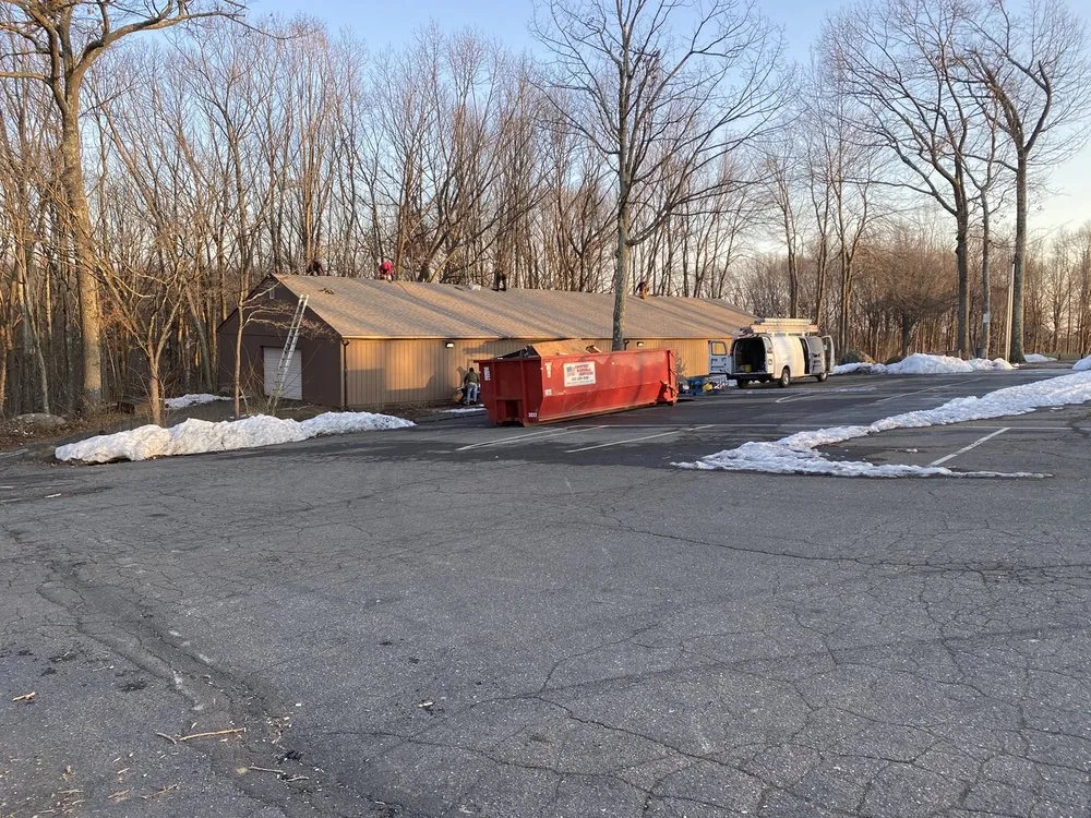 Slide of McKoy Roofing