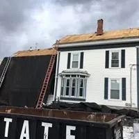 Slide of McKoy Roofing