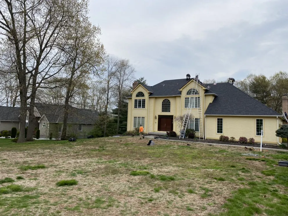 Slide of McKoy Roofing