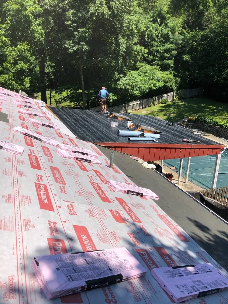 Slide of McKoy Roofing