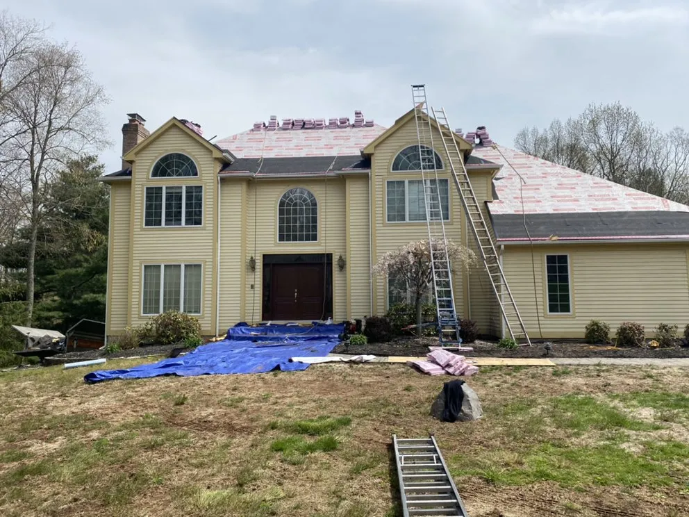 Slide of McKoy Roofing