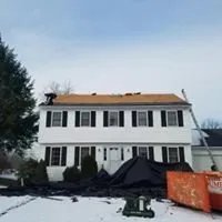 Slide of McKoy Roofing