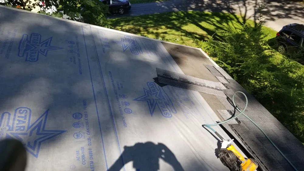 Slide of McMannis Roofing