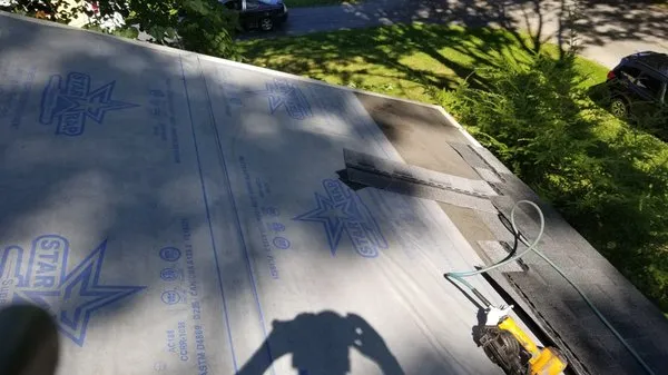 McMannis Roofing Logo