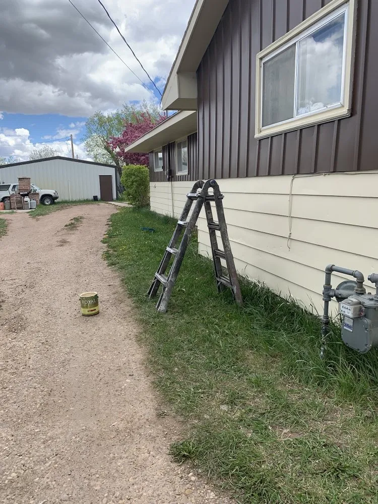 Slide of McMillan Handy Man Service