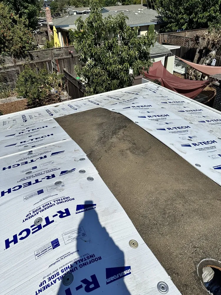 Slide of McMillan Roofing