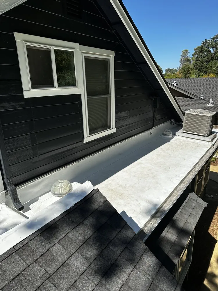 Slide of McMillan Roofing