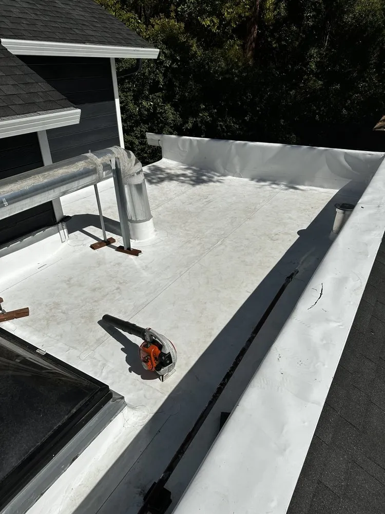 Slide of McMillan Roofing